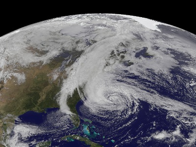 An image of Hurricane Sandy taken by the GOES-13 satellite on October 28.  This category 1 <a href="/earth/Atmosphere/hurricane/hurricane.html&edu=elem&dev=">hurricane</a> was huge, spanning a horizontal distance of about one-third the US continental landmass.  The storm came onshore in New Jersey, and gradually moved northeast.  The storm disrupted the lives of tens of millions in the eastern US, doing billions of dollars in damage, resulting in over 30 deaths.  Visit the National Hurricane Center's webpage on <a href="http://www.nhc.noaa.gov/">Hurricane Sandy</a> for details.<p><small><em>Image courtesy of NASA</em></small></p>