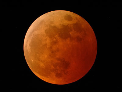 Lunar eclipses are special events that only occur when certain conditions are met. First of all, the Moon must be in <a href="/the_universe/uts/moon3.html&edu=high&dev=1">full phase</a>. Secondly, the <a href="/sun/sun.html&edu=high&dev=1">Sun</a>, <a href="/earth/earth.html&edu=high&dev=1">Earth</a> and <a href="/earth/moons_and_rings.html&edu=high&dev=1">Moon</a> must be in a perfectly straight line. If both of these are met, then the Earth's shadow can block the Sun's light from hitting the Moon.  The reddish glow of the Moon is caused by light from the Earth's limb scattering toward the Moon, which is reflected back to us from the Moon's surface.<p><small><em>Image credit - Doug Murray, Palm Beach Gardens, Florida</em></small></p>
