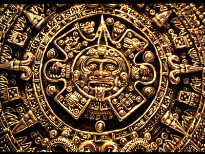 For the Aztecs, who lived in central Mexico, <a href="/mythology/tonatiuh.html&edu=elem&dev=1">Tonatiuh</a> was a <a href="/sun/sun.html&edu=elem&dev=1">Sun</a> god. Aztecs believed that four suns had been created in four previous ages, and all of them had died at the end of each cosmic era. Tonatiuh was the fifth sun and the present era is still his. The carvings on this sunstone represent the four cycles of creation and destruction in the Aztec creation story. The skull at the center depicts the god Tonatiuh.<p><small><em>   Image courtesy of Corel Corporation.</em></small></p>